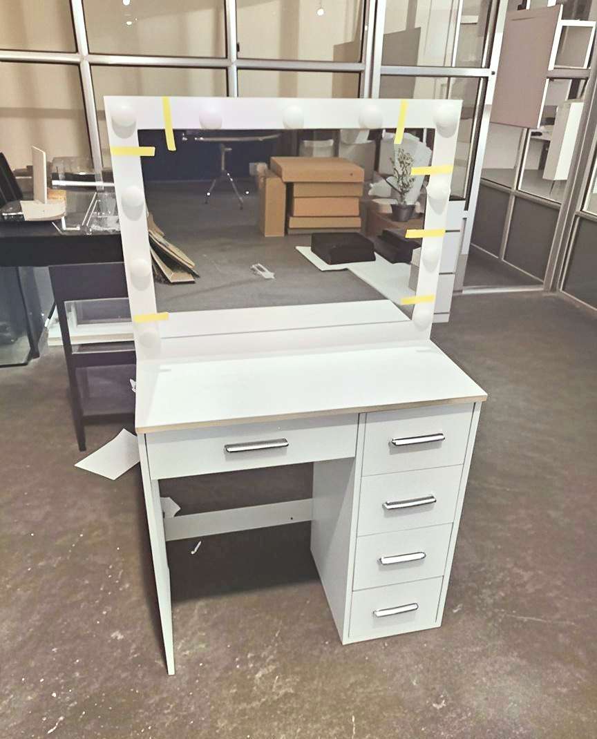 White Dressing Table with mirror in a showroom setting
