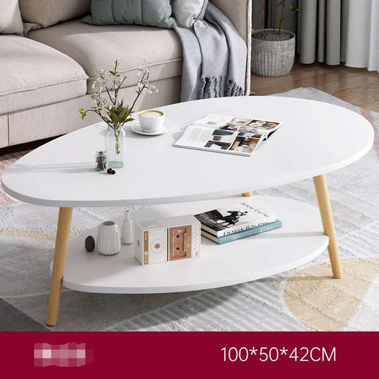 White coffee table with wooden legs in a living room setting
