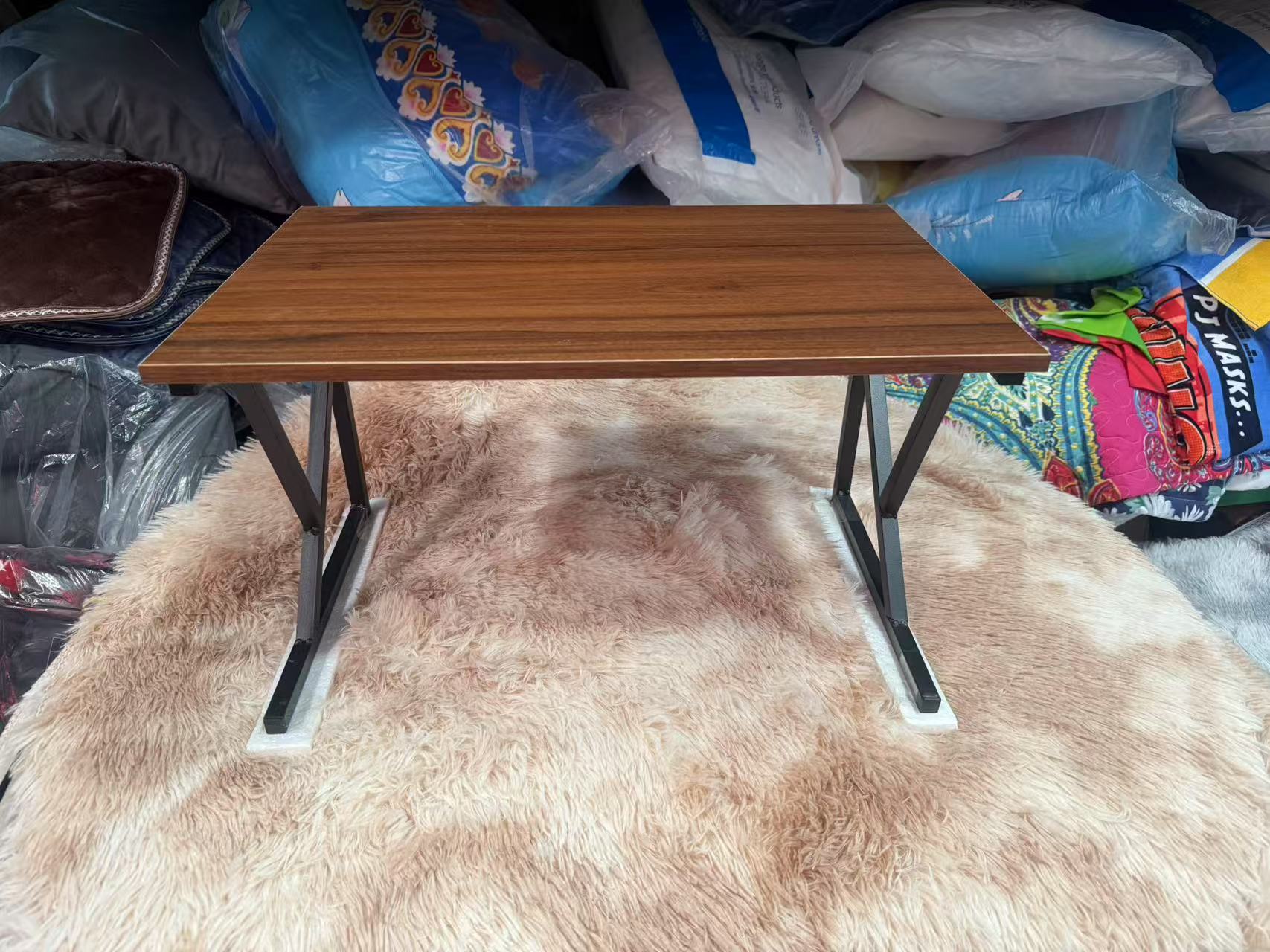 A brand new kitchen bench top rack shelf with a wooden MDF board top and metal frame